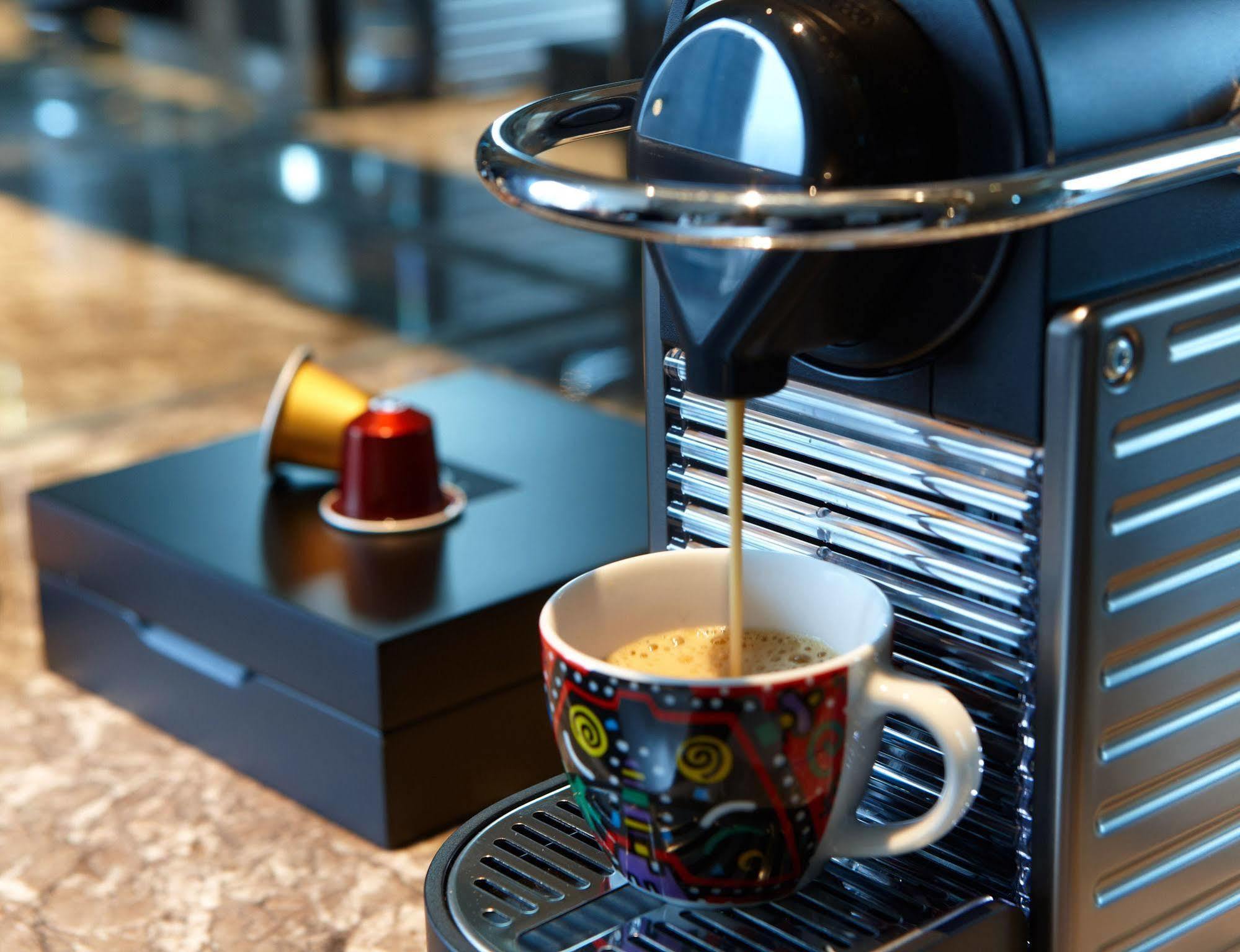 Hotel Humble House Taipei, Curio Collection By Hilton Exterior foto A Nespresso machine